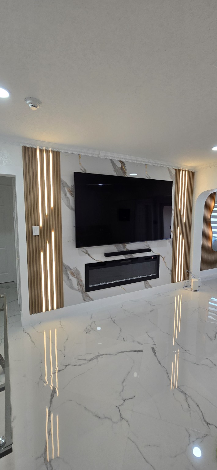 Decorative marble and slat TV wall